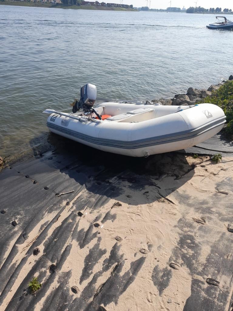 Rubberboot met motor, Watersport en Boten, Overige merken, Gebruikt, Ophalen of Verzenden, Benzine