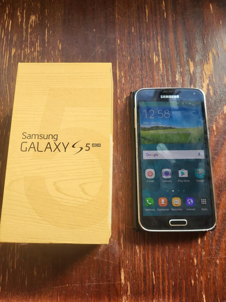 Samsung Galaxy S5 met doos, hoesje en oplader, Telecommunicatie, Mobiele telefoons | Samsung, Gebruikt, Zwart, Touchscreen, Ophalen of Verzenden