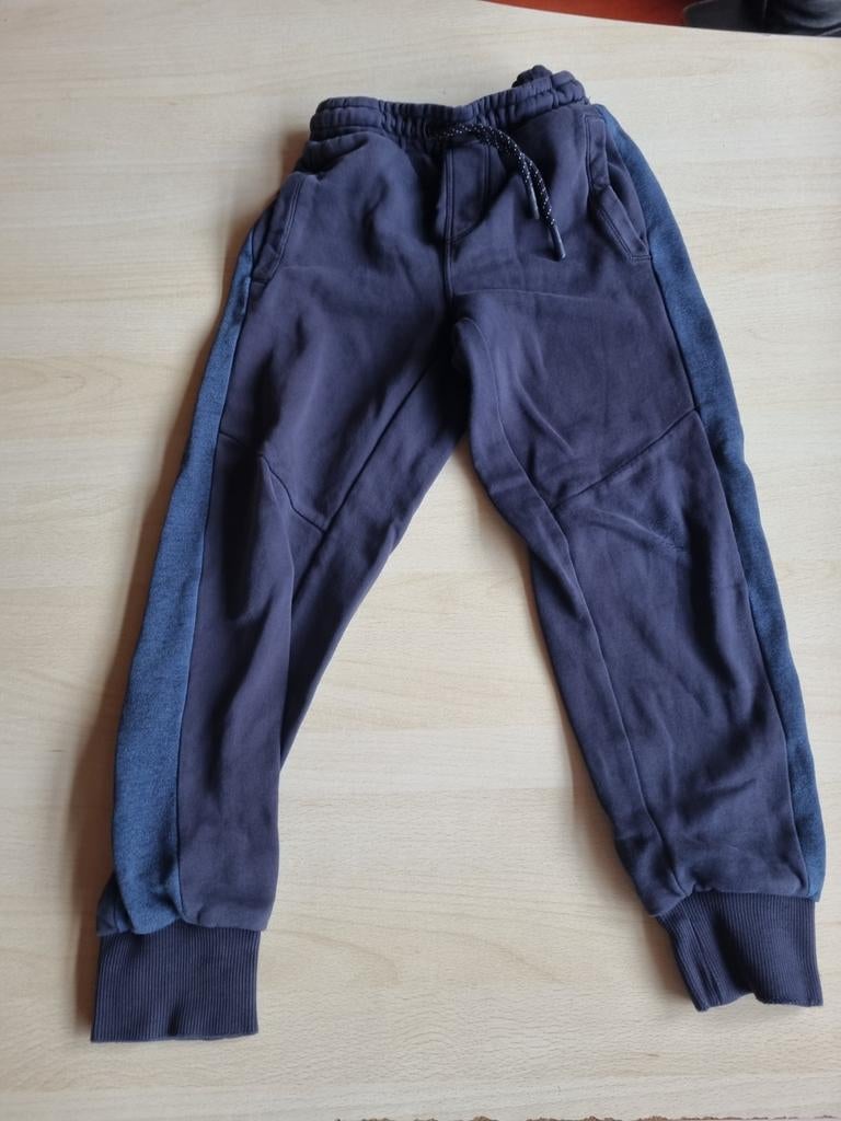 Donkerblauwe joggingbroek met zijstrepen, Ophalen