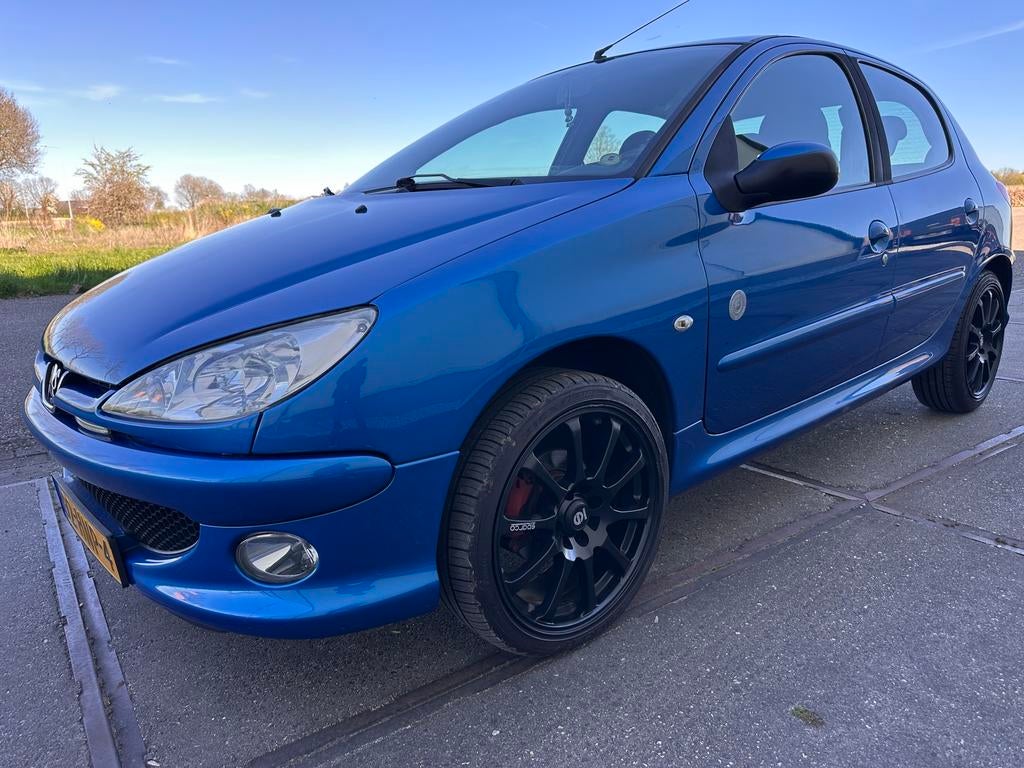 Peugeot 206  Generation 1.4 5D 2009 Blauw, Auto's, Voorwielaandrijving, Stof, 4 cilinders, Blauw