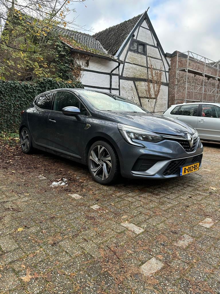Renault Clio 1.6 E-tech Hybrid 140pk 2022 RS LINE - Garantie, Auto's, Renault, Euro 6, Leder en Stof, 23 km/l, Origineel Nederlands