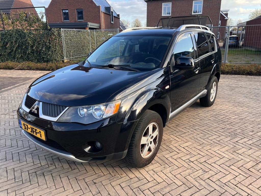 Mitsubishi Outlander 2.4 MPI 2009  LPG G3 1ste Eigenaar NAP!, Auto's, Voorwielaandrijving, Stof, Outlander, Zwart