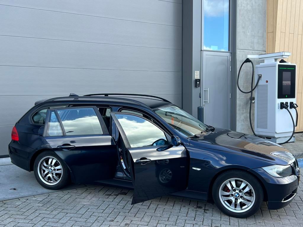 Goedrijdende BMW 3-Serie 320i E91 Touring 150PK/Navi/Apk/AC!, Auto's, 13 km/l, 1995 cc, 4 cilinders, Blauw