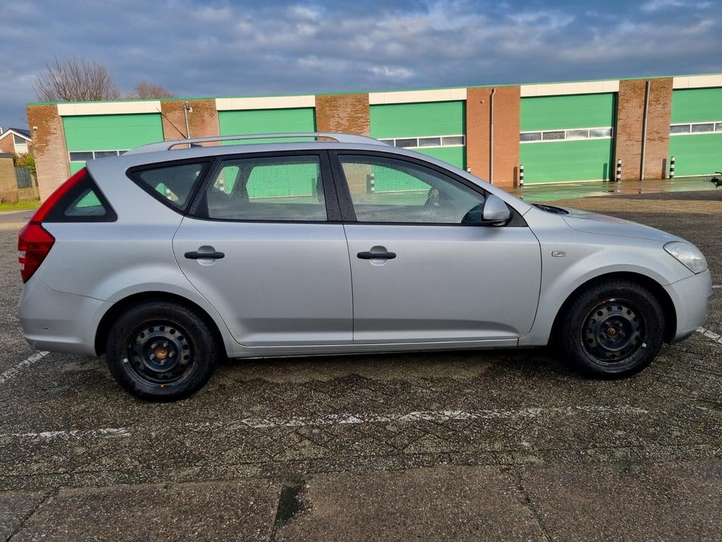 Kia cee'd 1.4 sporty wagon, Voorwielaandrijving, Stof, 4 cilinders, Elektrische ramen