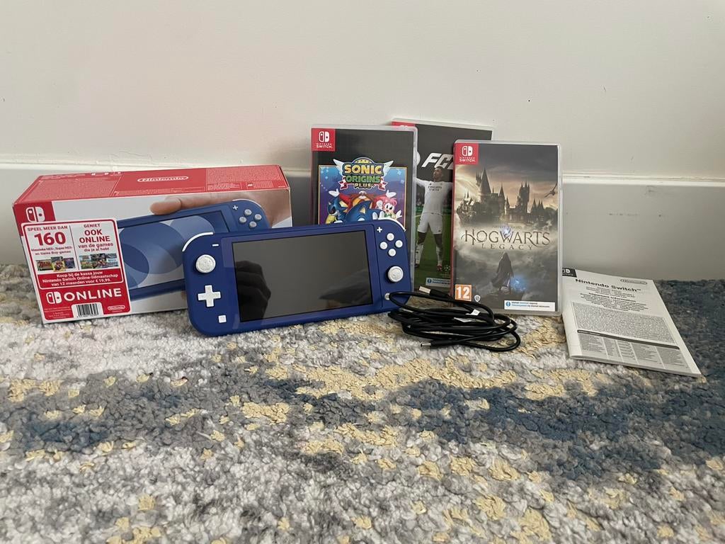 Nintendo Switch Lite Blauw + 3 games, Spelcomputers en Games, Spelcomputers | Nintendo Switch, Zo goed als nieuw, Switch Original