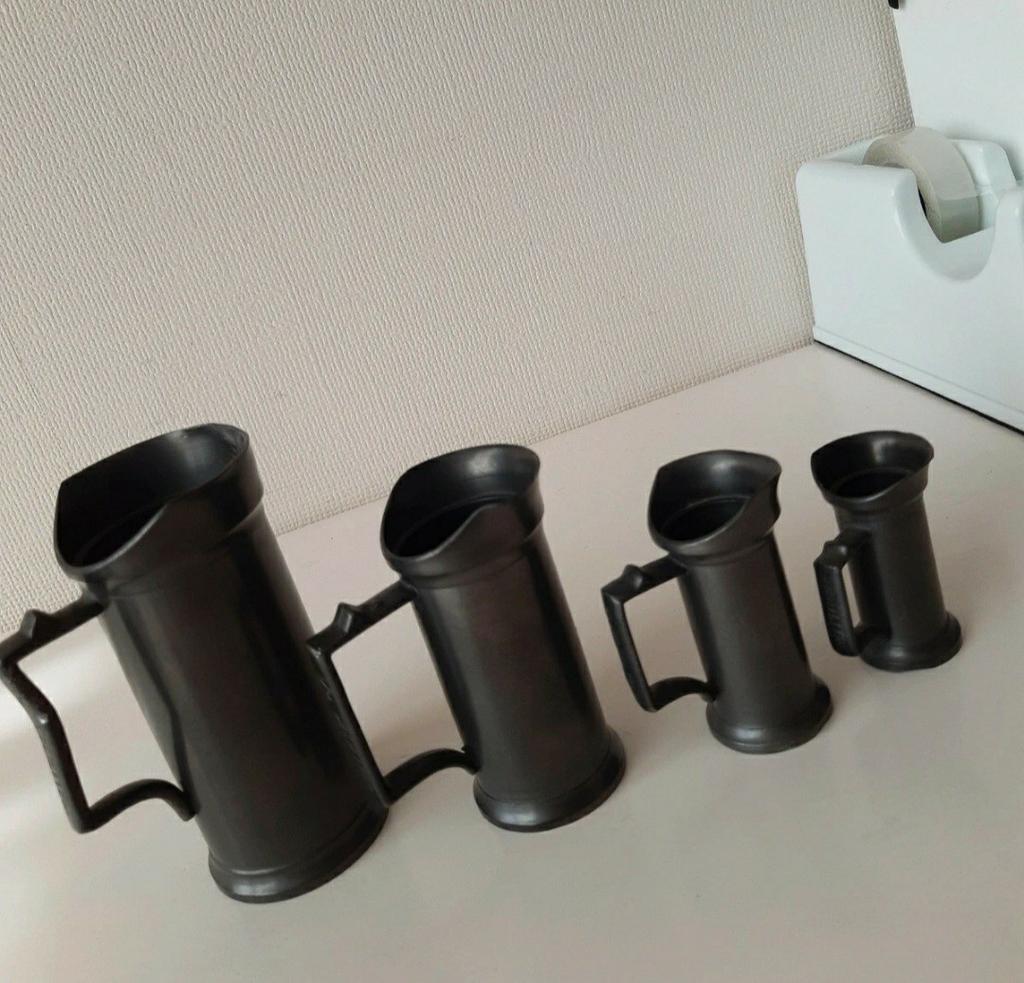 Set van 4 tinnen kannetjes, Ophalen of Verzenden