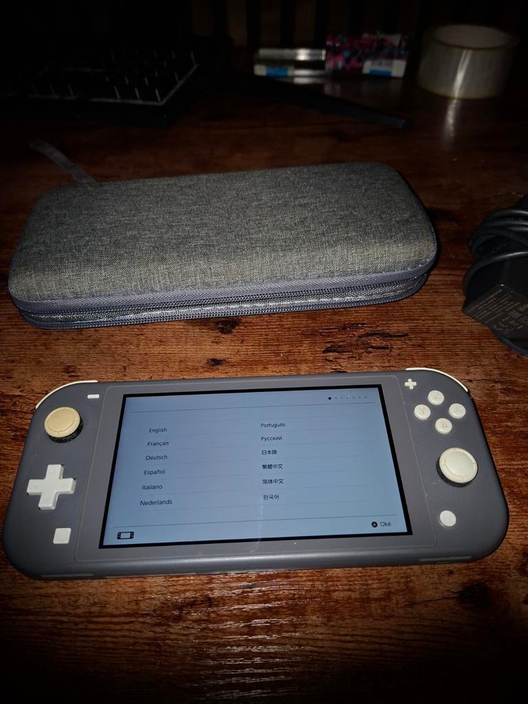 Nintendo Switch Lite, Ophalen of Verzenden, Grijs, Gebruikt, Met beschermhoes of tas