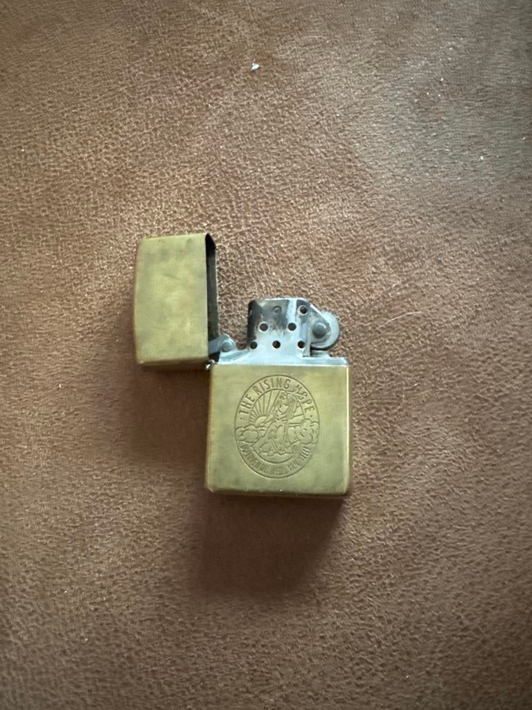 Zippo aansteker "The Rising Hope" van Van Nelle, Ophalen of Verzenden, Gebruikt, Aansteker