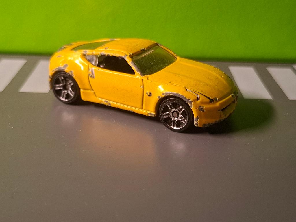 Hotwheels - Nissan 370Z [geel] 1/60, Ophalen of Verzenden, Gebruikt, Auto