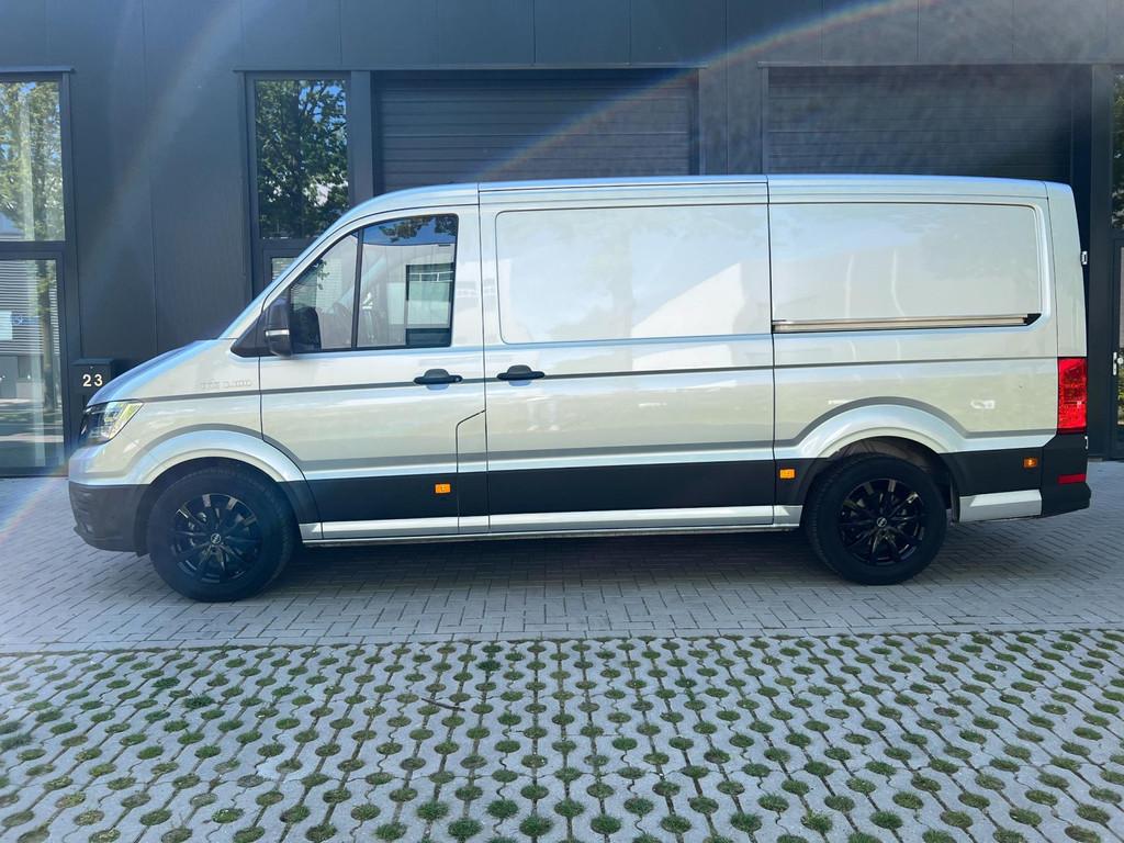 MAN TGE 35 2.0 l+r-schuifdeur Z.G.A.N L2H1 177pk, Auto's, Gebruikt, Zwart, 4 cilinders, Bedrijf