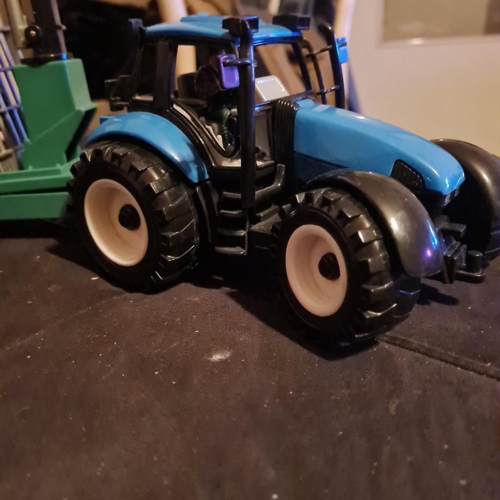 SIKU. Tractor met houtlader, Kinderen en Baby's, Speelgoed | Speelgoedvoertuigen, Ophalen of Verzenden