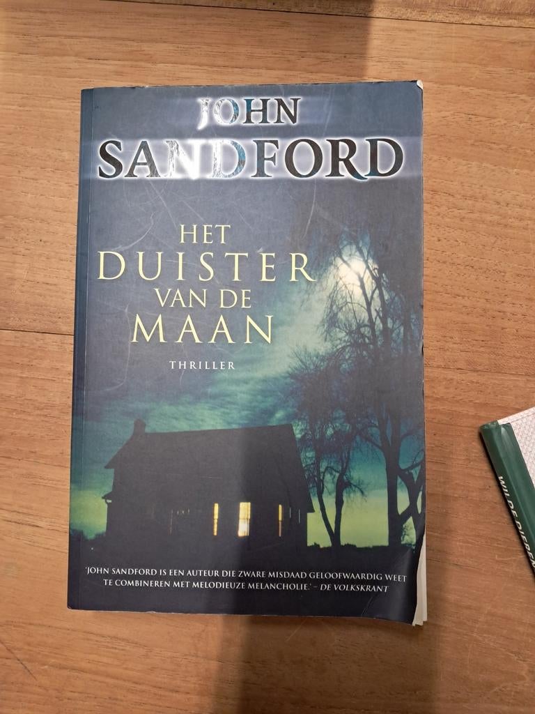 John Sandford - Het duister van de maan, Ophalen of Verzenden, Zo goed als nieuw, John Sandford
