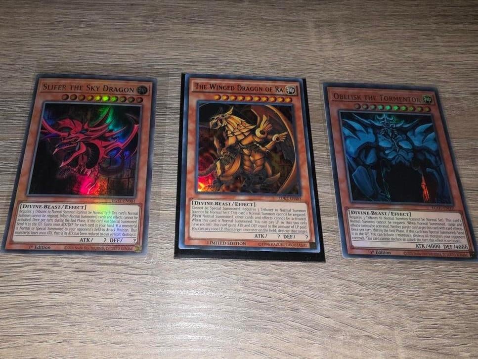 Yu-Gi-Oh Egyptian God Cards N/M, Ophalen of Verzenden, Zo goed als nieuw, Meerdere kaarten