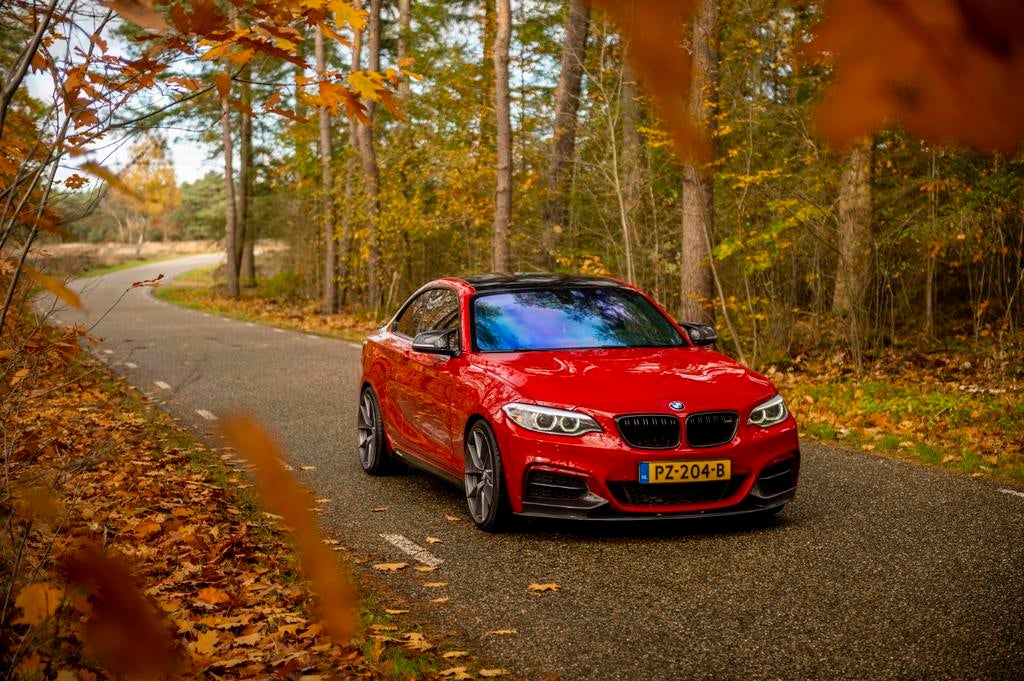 BMW 2-Serie M235i 370PK Coupe 2014 Rood, Auto's, BMW, Achterwielaandrijving, Zwart, 4 stoelen, 1445 kg