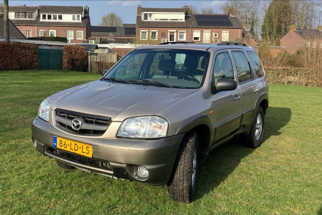 Mazda Tribute 3.0 V6 Touring AUT 4WD 2002 Bruin, Auto's, Automaat, Bruin, Origineel Nederlands, Particulier