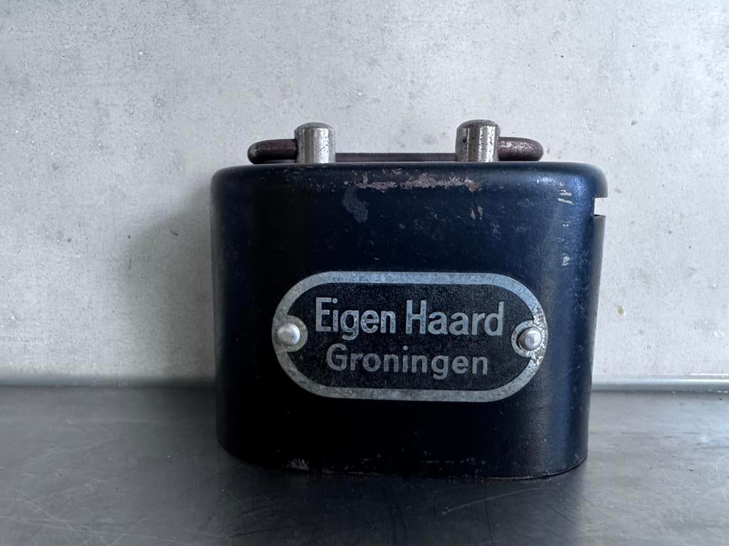 Oude spaarpot van woningstichting Eigen Haard Groningen, Ophalen of Verzenden, Gebruikt, Metaal of Blik, Overige thema's