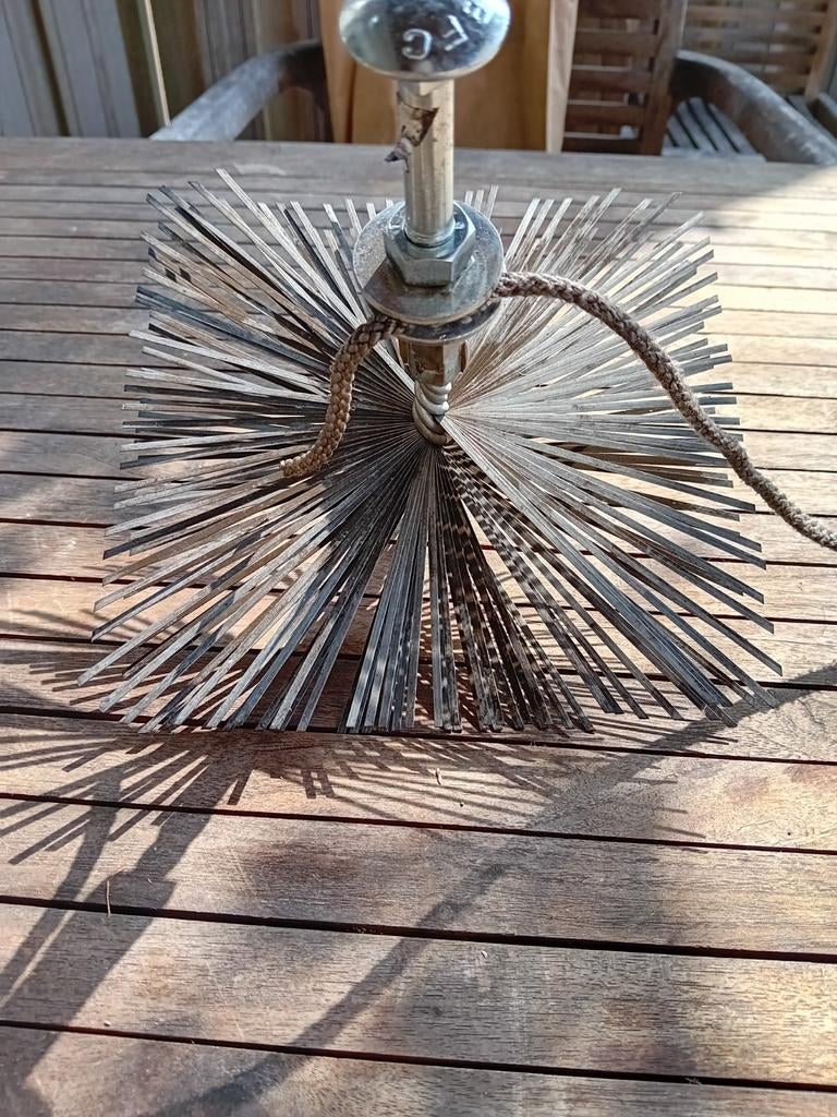 Schoorsteen borstel, Ophalen