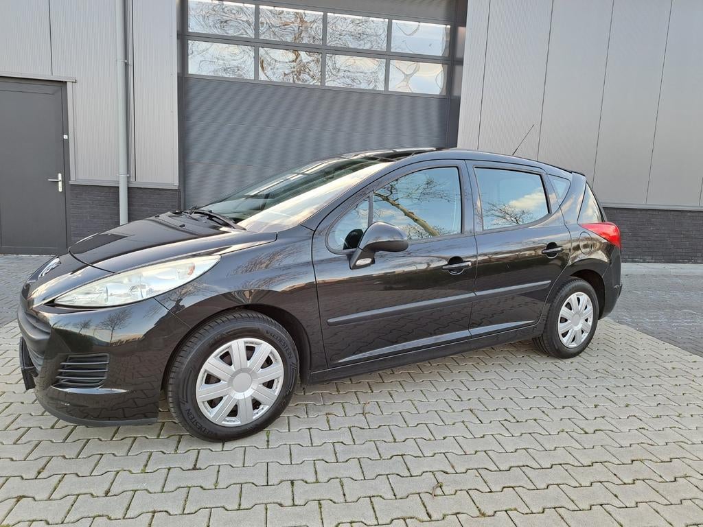 Peugeot 207 SW 1.4 AIRCO | PANO | TREKHAAK | APK | 2010 |, Voorwielaandrijving, Stof, 1360 cc, Zwart