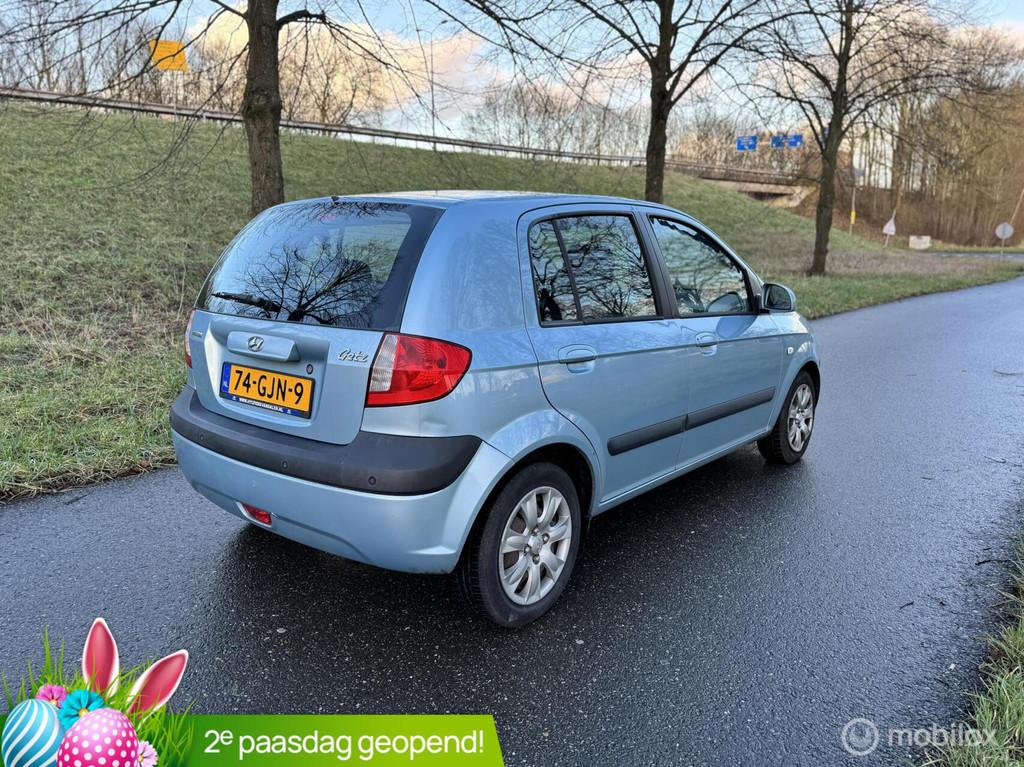 Hyundai Getz 1.4i Active Joy*APK 01/27*PARKEERSENSOR*AIRCO, Zwart, 4 cilinders, Blauw, Origineel Nederlands