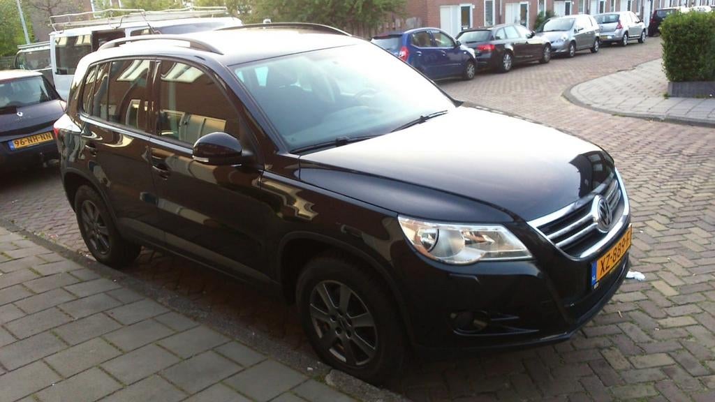 Volkswagen Tiguan 1.4 TSI 110KW 2009 Zwart 143.300km €5590, Auto's, Voorwielaandrijving, Euro 5, Stof, 1800 kg