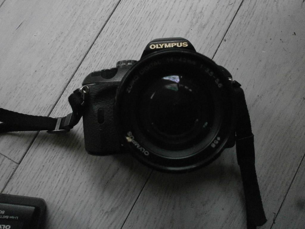 olympus digitale camera type E 410 met oplader en draagriem, Ophalen of Verzenden, Zo goed als nieuw, Olympus, 8 keer of meer