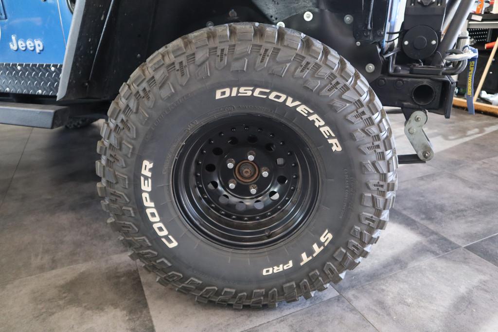 Jeep Wrangler 4.0i Softtop 4WD Luxe Leder Automaat Uniek LED, Cabriolet, Blauw, Leder, Vierwielaandrijving