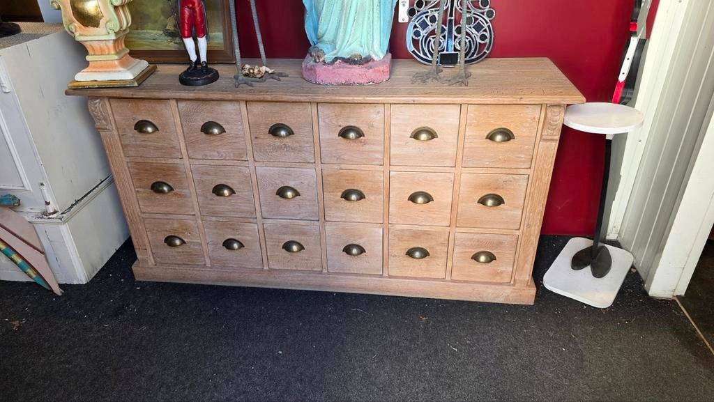 Vol eiken apothekers lade blok, Ophalen