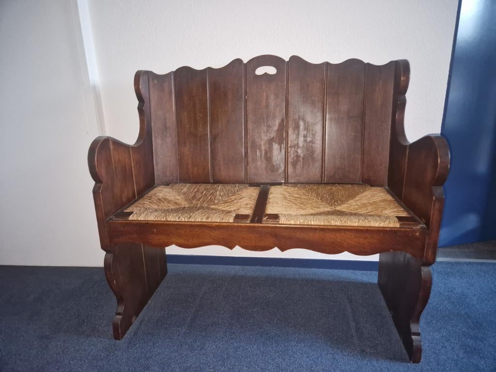 Houten bankje met rieten zitting, Ophalen