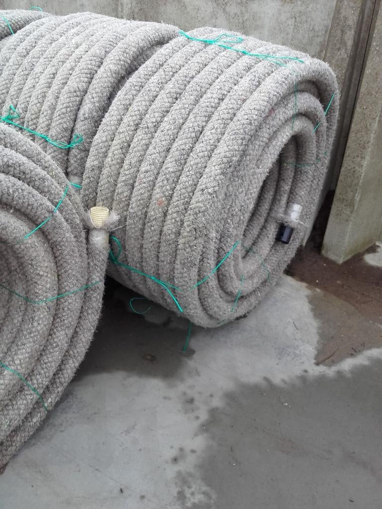 Drainagebuis 60mm rol 150 mtr voor 215,- euro, Doe-het-zelf en Verbouw, Overige materialen, 6 meter of meer, Overige typen, Nieuw