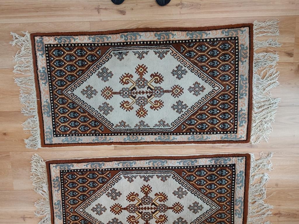 2 handgemaakte Tunesische tapijten, Ophalen