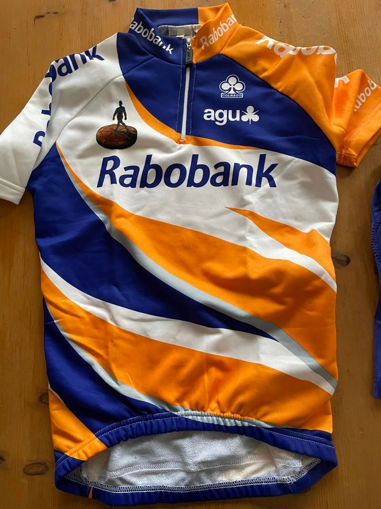 Rabobank Wielrenpakje Kinderen - Zo Goed Als Nieuw, Kinderen, Overige maten, Ophalen of Verzenden, Zo goed als nieuw