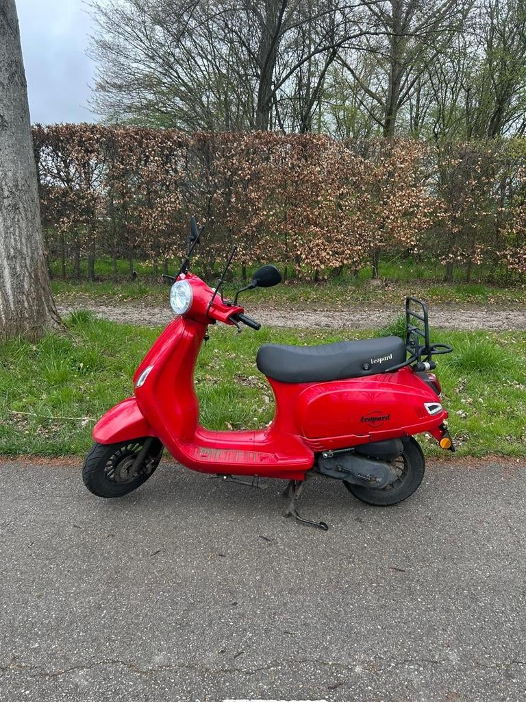 Rode Leopard Scooter - gebruikt, Ophalen of Verzenden, Gebruikt, Overige typen, Overige merken