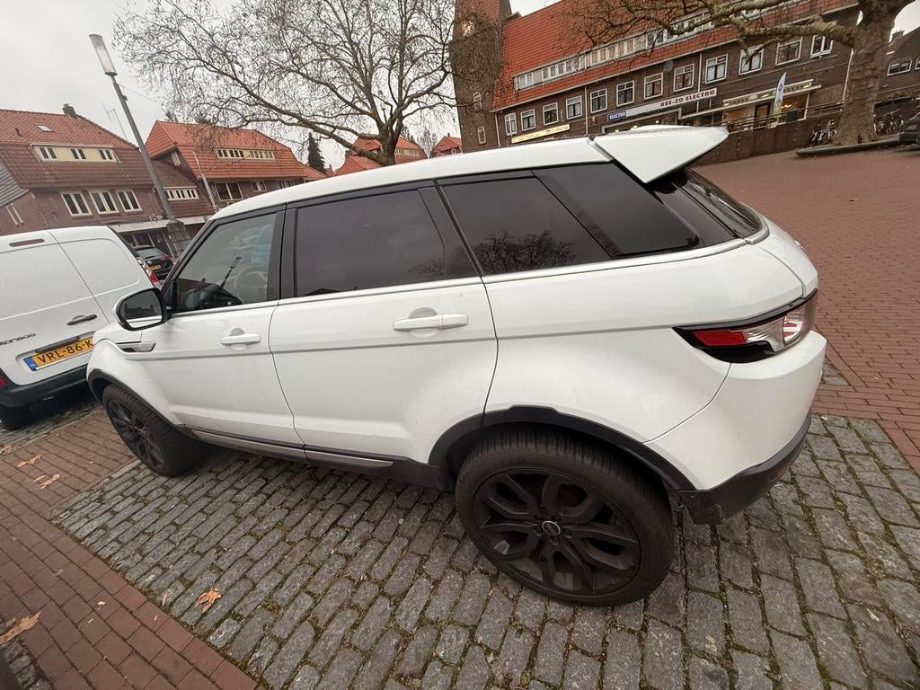 Land Rover Range Rover Evoque SI4 4WD AUT 2012 Wit, Auto's, Automaat, 1800 kg, 4 cilinders, Wit