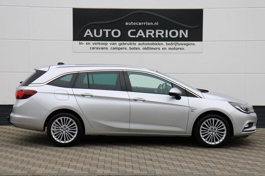 Opel Astra Sports Tourer 1.4 Turbo 150PK 120 Jaar Edition, Voorwielaandrijving, Stof, Gebruikt, 4 cilinders