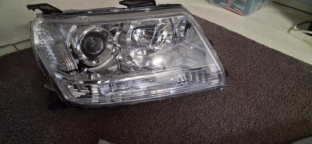 Koplamp links Suzuki Grand Vitara 2.4 2010, Ophalen of Verzenden, Nieuw, Suzuki