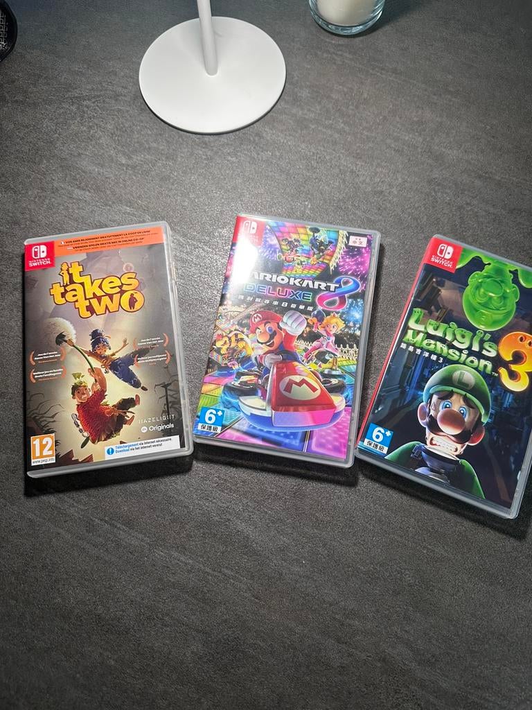 Nintendo Switch OLED+ veel accessories + 3 games +512GB, Racen en Vliegen, Eén computer, Ophalen of Verzenden, Zo goed als nieuw