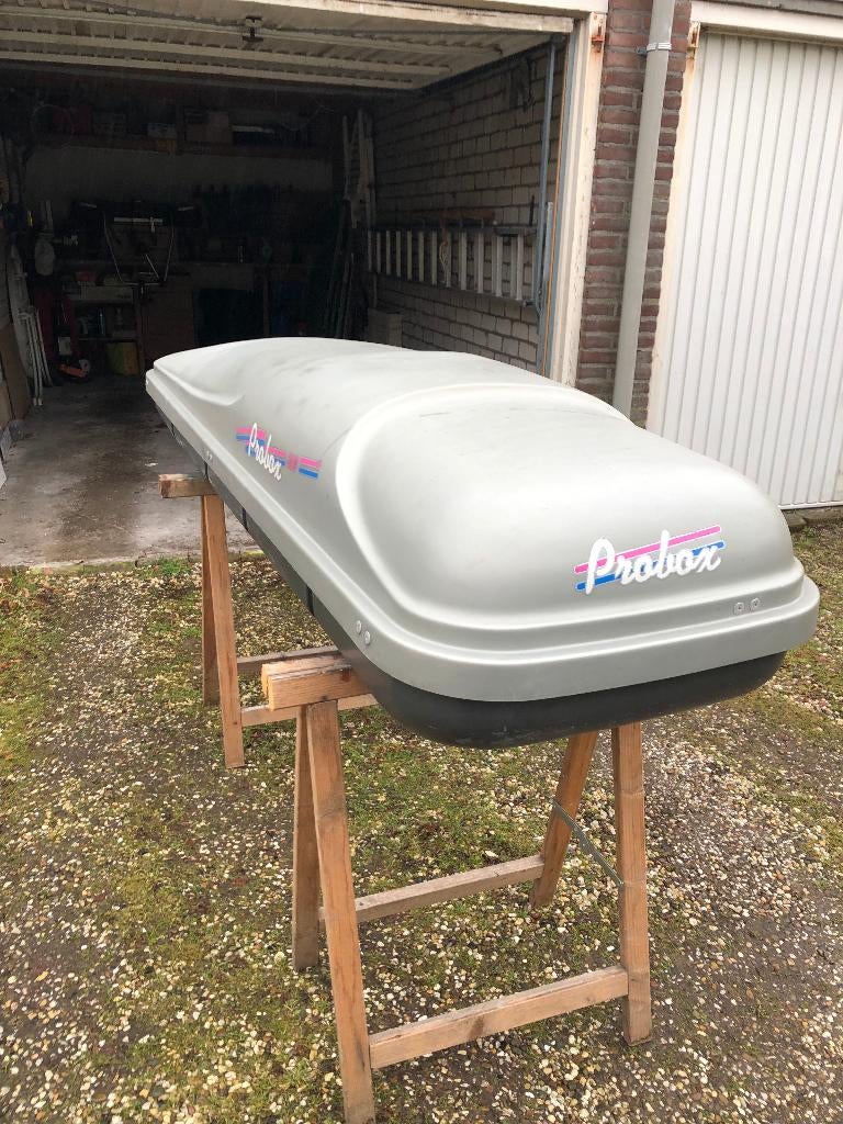 Ski-box met beugels zonder dakdragers, Ophalen