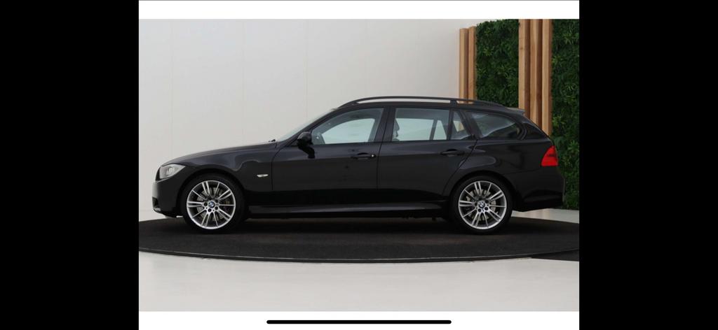 BMW 335i Touring AUT 2007 Zwart 98.500 NAP 400PK, Automaat, 1800 kg, Zwart, Vierwielaandrijving
