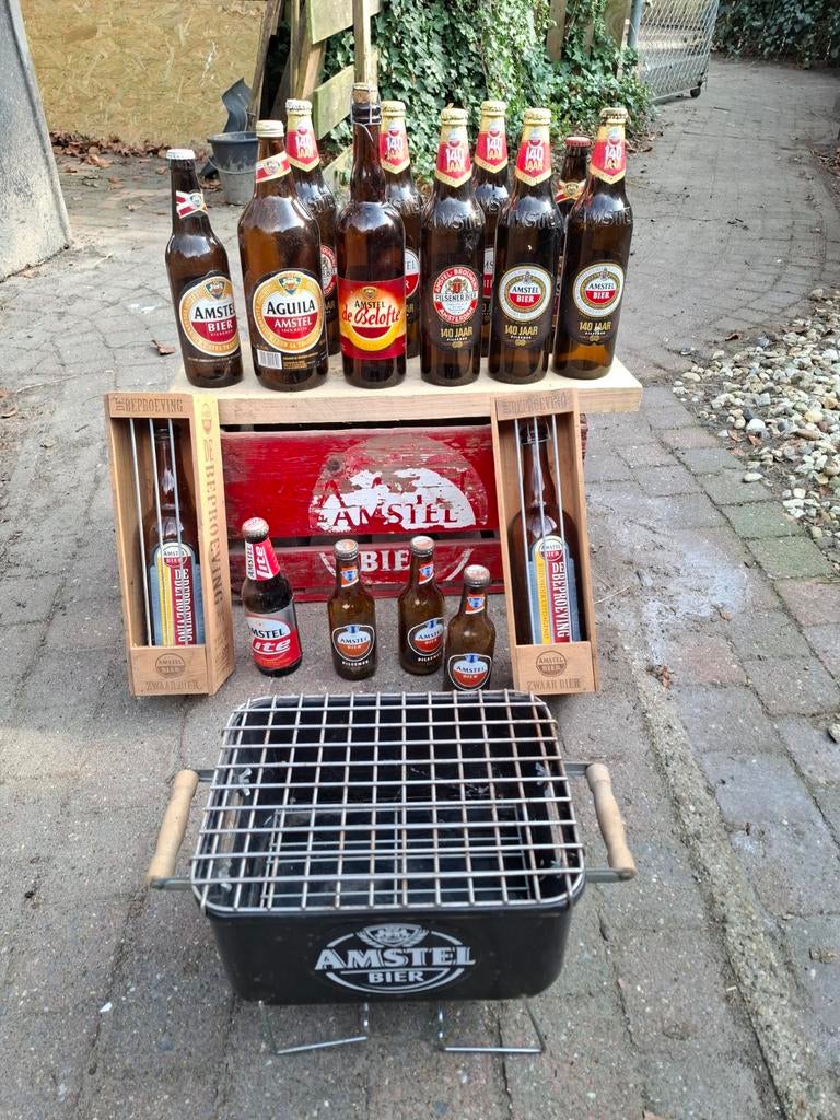 Oude houten amstel kratje + oude flesjes, Ophalen of Verzenden, Flesje(s), Amstel