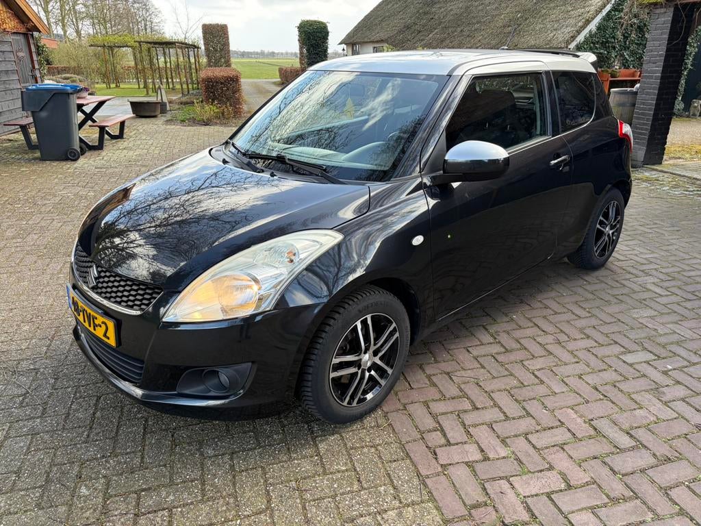 Suzuki Swift exclusive  cruise / climate control / navi, Voorwielaandrijving, Stof, Origineel Nederlands, Handgeschakeld