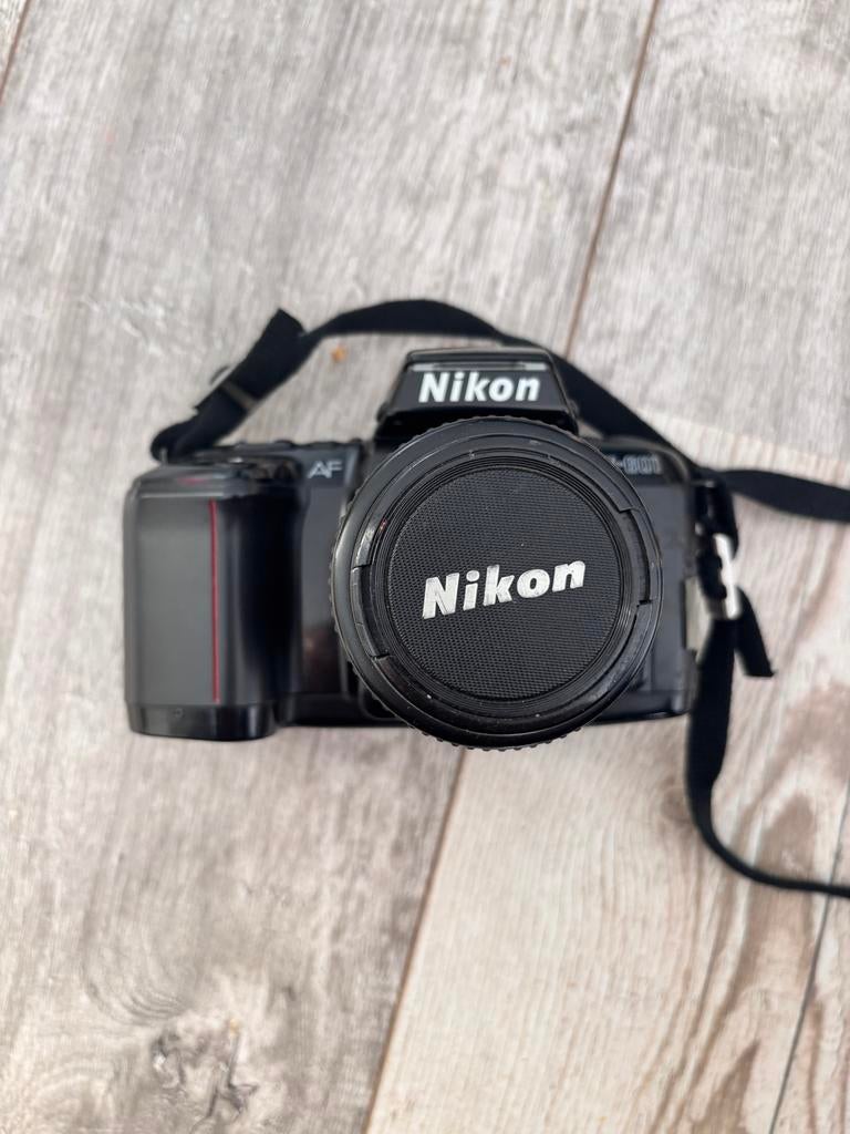 Nikon Analoge Spiegelreflexcamera + 35-70mm lens + Film, Audio, Tv en Foto, Fotocamera's Analoog, Niet werkend, Spiegelreflex