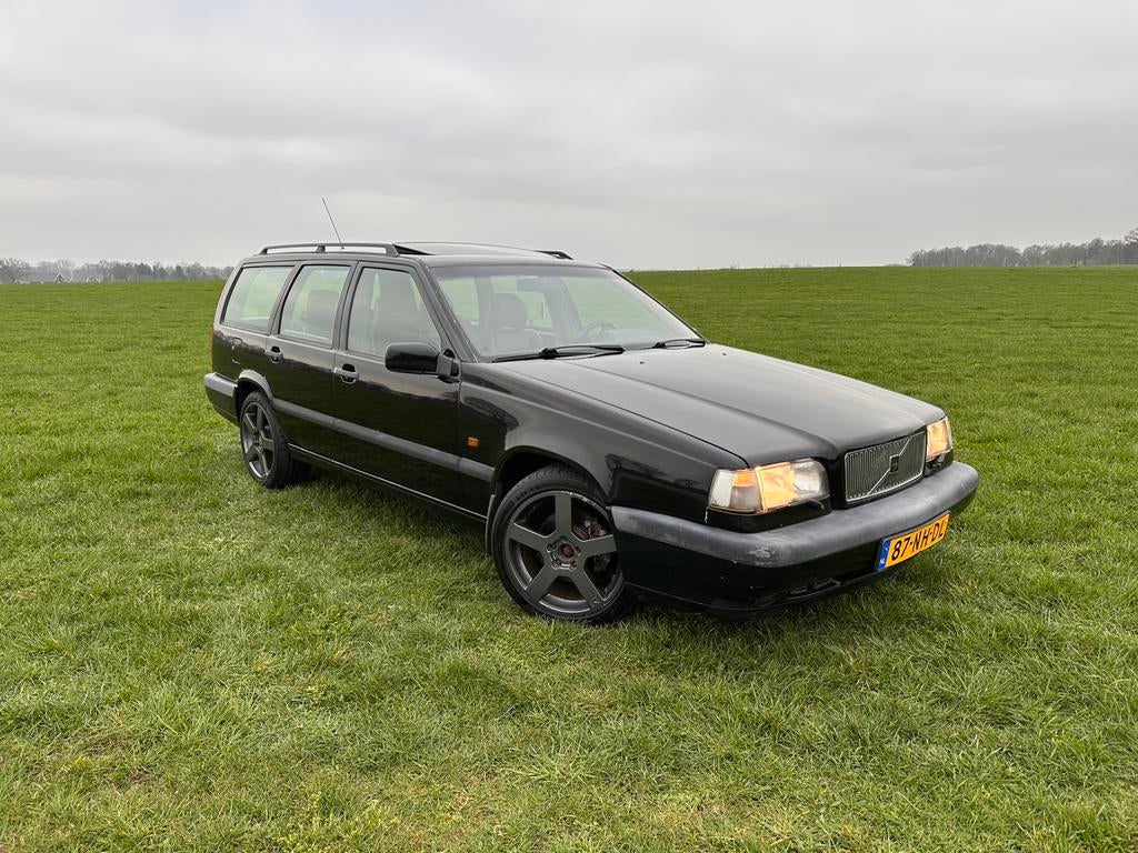 Volvo 850 2.5 I AUT 1995 Zwart, Auto's, 1408 kg, Stoelverwarming, Zwart, 700 kg