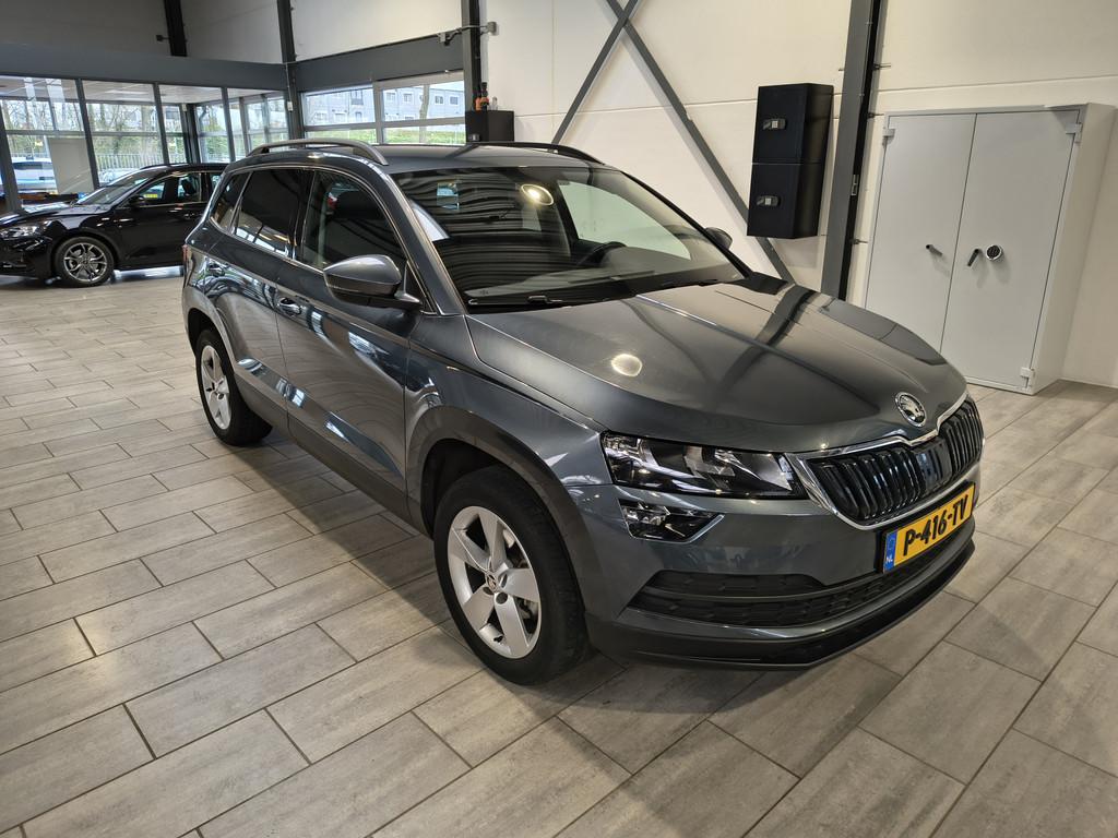 Skoda Karoq 1.0 TSI 115 pk Edition | Stoelverw. | Apple Carp, Voorwielaandrijving, 12 maanden, Stof, Gebruikt