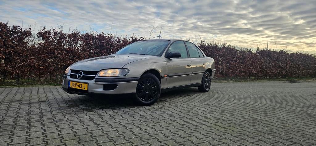 Opel 1997 Grijs, Automaat, 4 cilinders, 1436 kg, 1650 kg