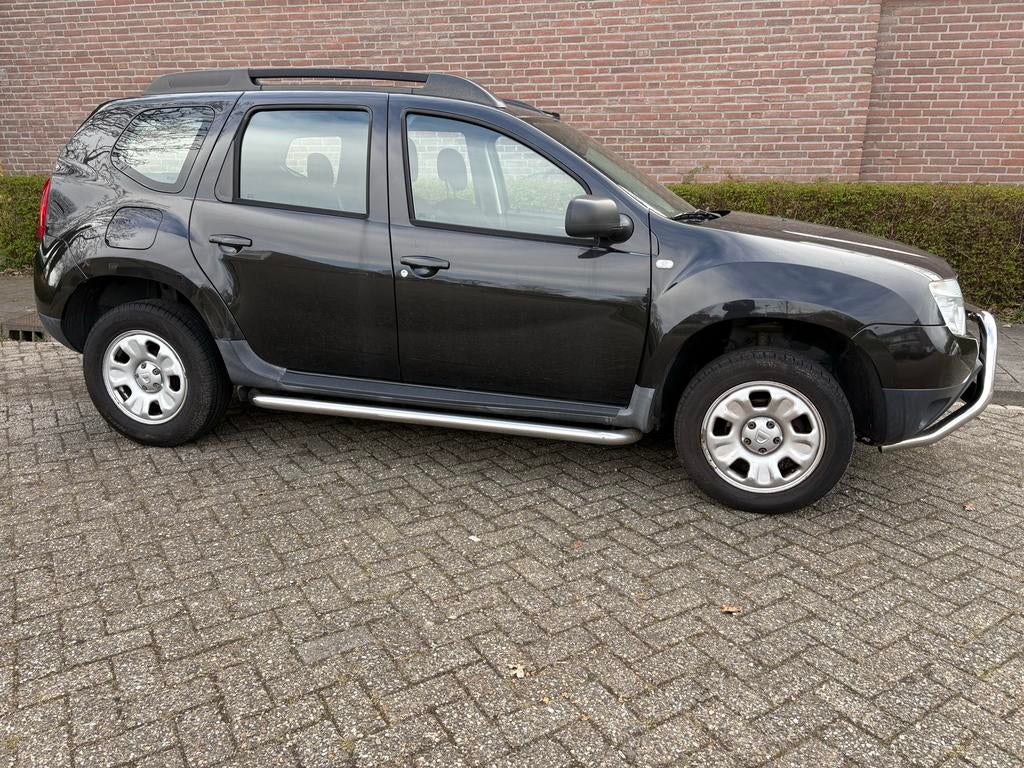 Dacia Duster 1.6 16V 4X2 2010 Zwart, Auto's, Dacia, Stof, Zwart, 4 cilinders, Duster