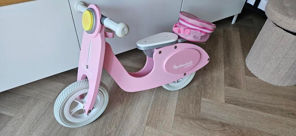 Roze Janod loopfiets, Ophalen