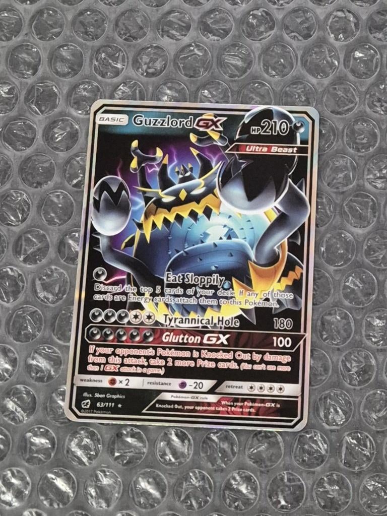 Guzzlord GX 63/111 Crimson Invasion Sun & Moon, Ophalen of Verzenden, Zo goed als nieuw, Losse kaart, Foil