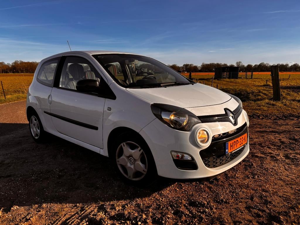 Renault Twingo 1.2 55KW E3 2014 Wit, Auto's, 839 kg, 74 pk, 4 cilinders, 4 stoelen