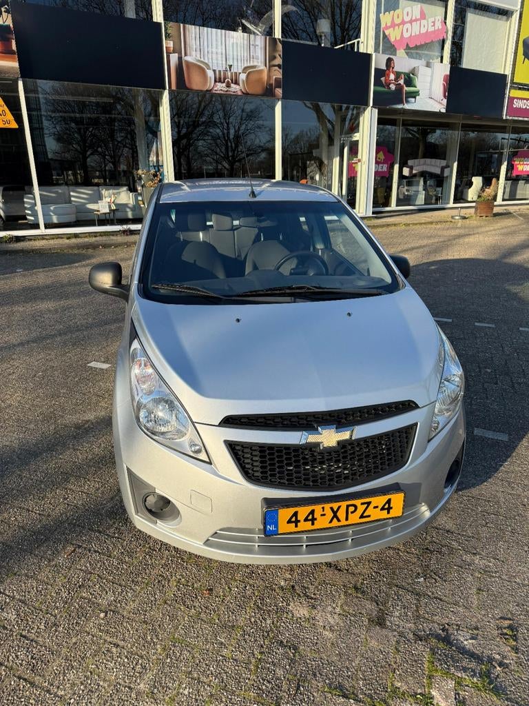 Chevrolet Spark 1.0 Bifuel 2012 Grijs, Auto's, Chevrolet, 15 km/l, 37 €/maand, 4 cilinders, Origineel Nederlands