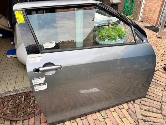 portier Suzuki Swift   2 deurs  BJ 2012, Auto-onderdelen, Gebruikt, Deur, Ophalen of Verzenden, Suzuki